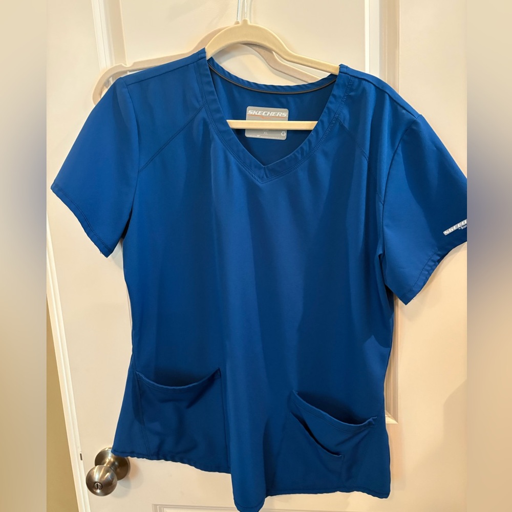 Royal blue sketchers scrub top